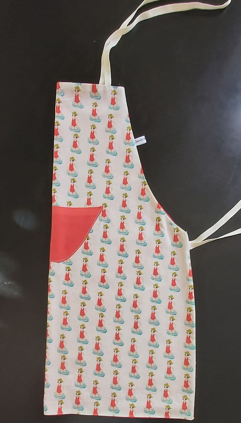 Tablier réversible coton « les nageuses » T4/8 ans